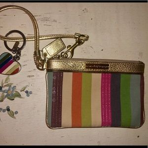 Cute striped COACH wristlet and matching key chain